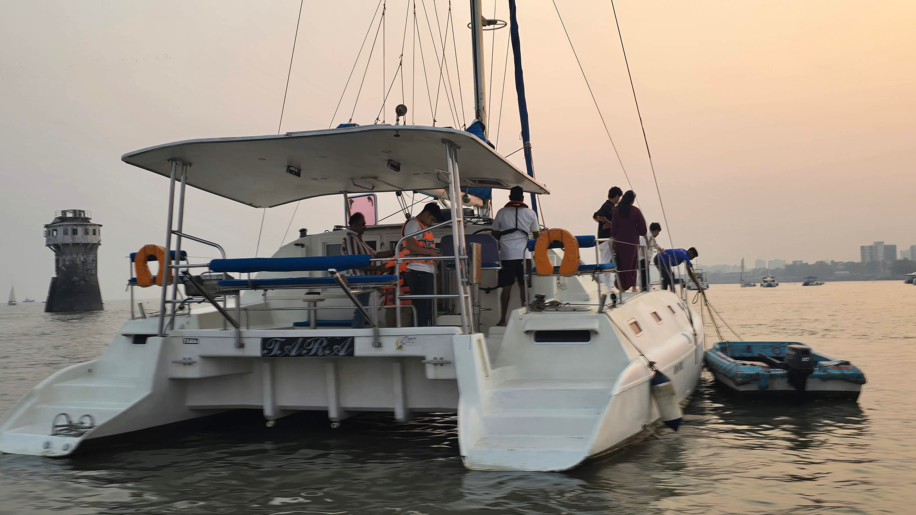 Tara's stern at sunset with the tender boat alongside